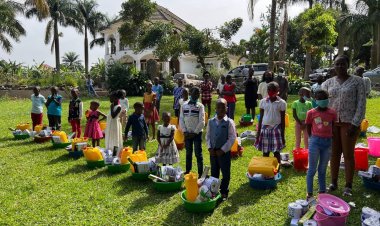 Former Presidential Candidate Bobi Wine encourages children to embrace education as he supports a section with scholastic materials